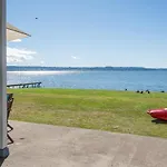 Blue Cottage On The Lake